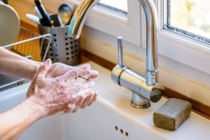 Handwashing in the kitchen.