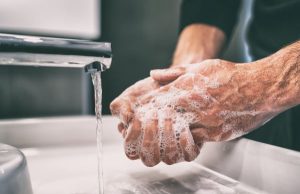 Washing hands.